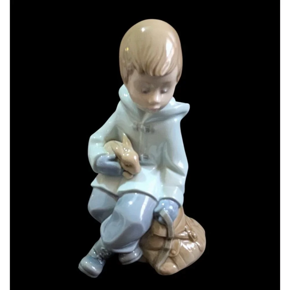 NAO by Lladro 1987 Figurine Boy Sitting on Bag Holding Bunny Rabbit‎ Vintage